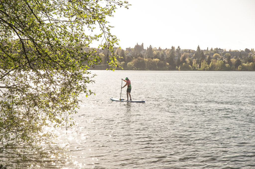 Person on a paddle board on Green Lake